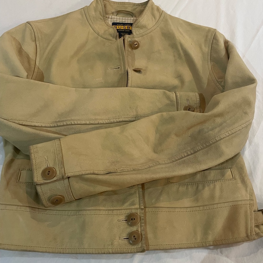 woman leather jacket , similar to a blazer